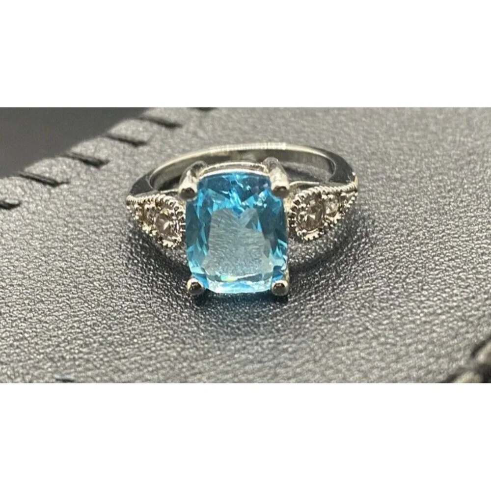 Emerald Cut Lab Blue Topaz Ring CZ Accents Size 5.75 3.4 grams Silver Plated - Picture 2 of 8